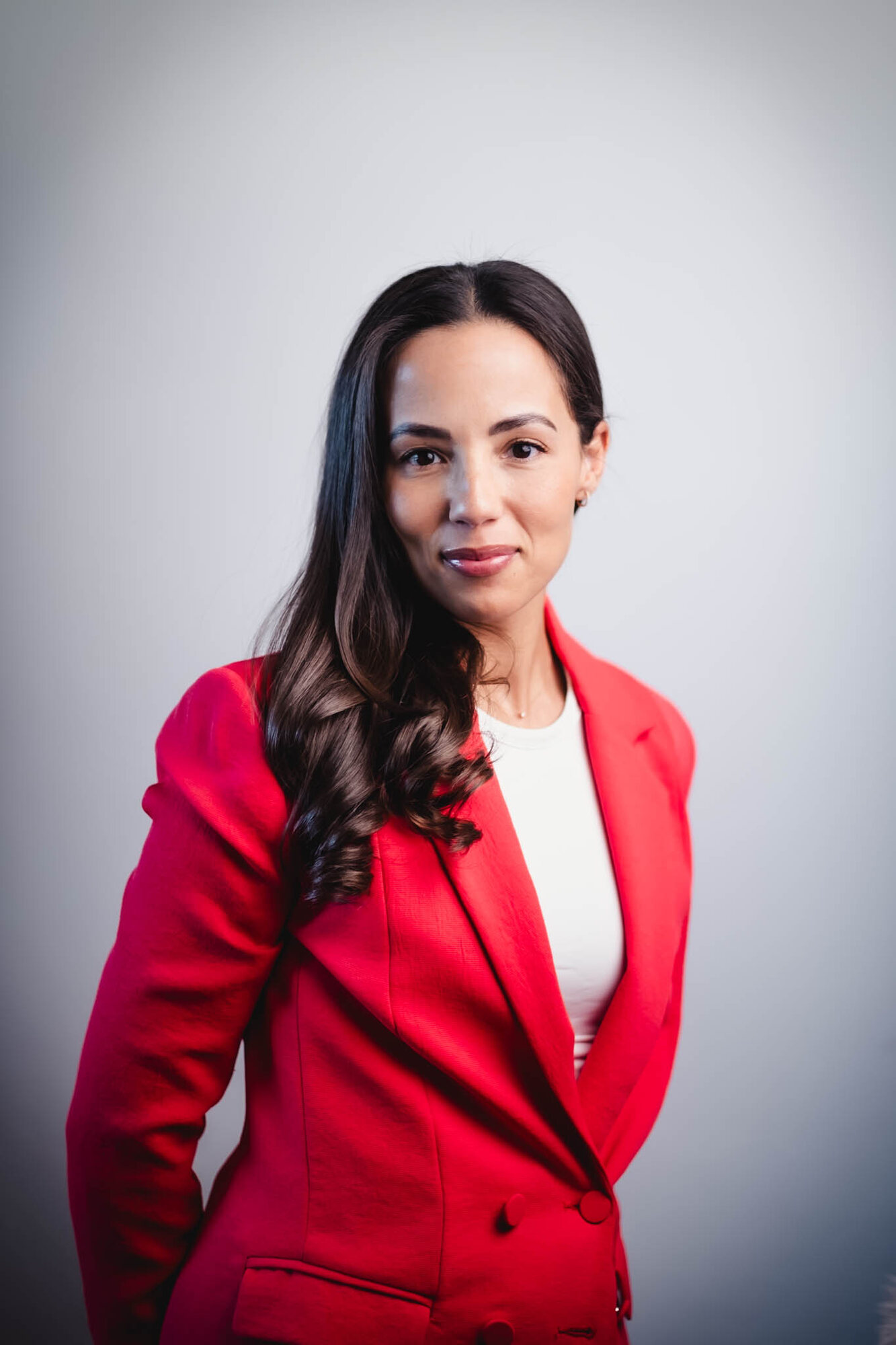 Headshot in red blazer