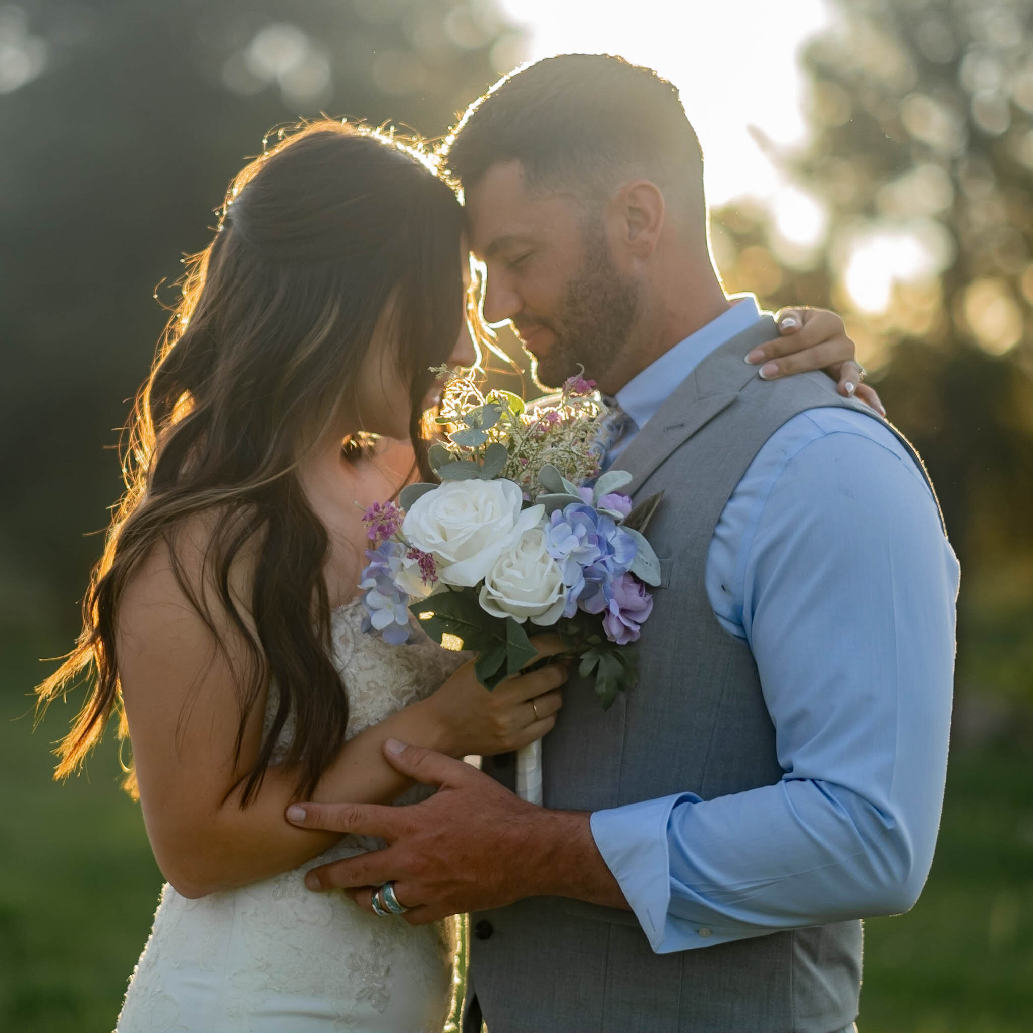 Bride at golden hour with bouquet